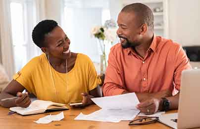 man and woman getting home improvement financing